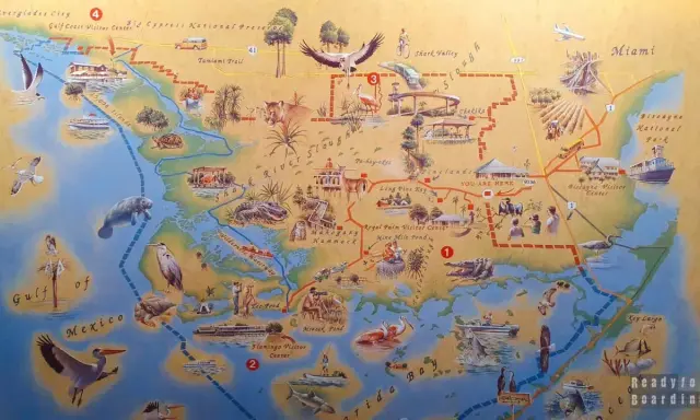 Mapa turystyczna Everglades z zaznaczonymi atrakcjami, zwierzętami i szlakami.