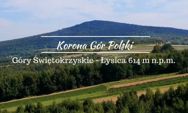 Łysica, najwyższy szczyt Gór Świętokrzyskich, wznosi się majestatycznie nad zielonymi wzgórzami.
