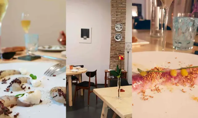 Un'elegante cena in un ristorante a Rimini. Piatti raffinati, bicchieri di vino e un'atmosfera accogliente con dettagli artistici.