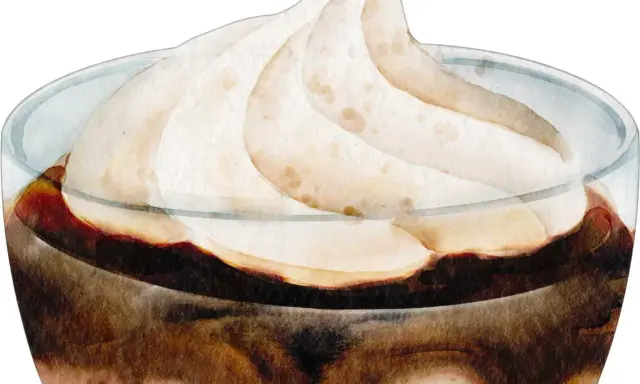 Gourmandise en verre : une onctueuse chantilly au chocolat, aux nuances douces et réconfortantes.