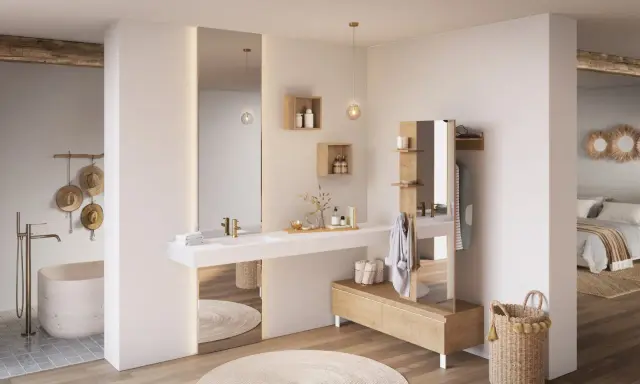 Chambre parentale avec salle de bain épurée, baignoire îlot, double vasque et dressing intégré. Ambiance zen et naturelle.