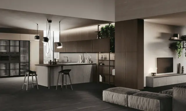 Cuisine en U ouverte sur salon, avec îlot central, tabourets et rangements intégrés. Ambiance moderne et épurée.