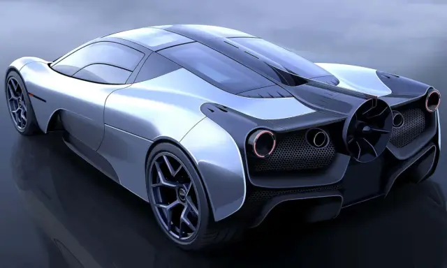 Der Gordon Murray T.50, ein Meisterwerk der Ingenieurskunst, zeigt seine aerodynamische Heckpartie mit markantem Lüfter und roten Rückleuchten.