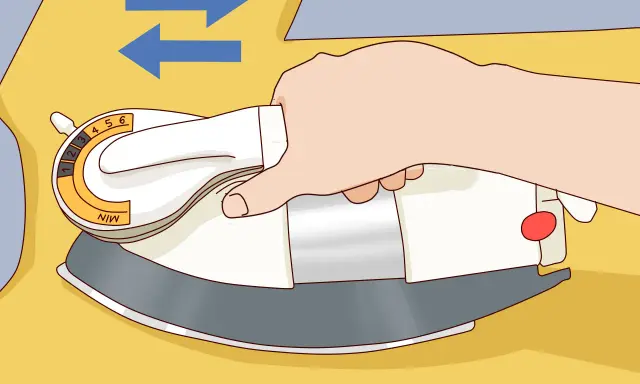 Plancha ropa de poliéster para encogerla sin secadora. Ajusta la temperatura y mueve la plancha.