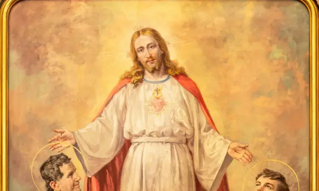 Jezus błogosławi młodego Dominika Savio i innego świętego.