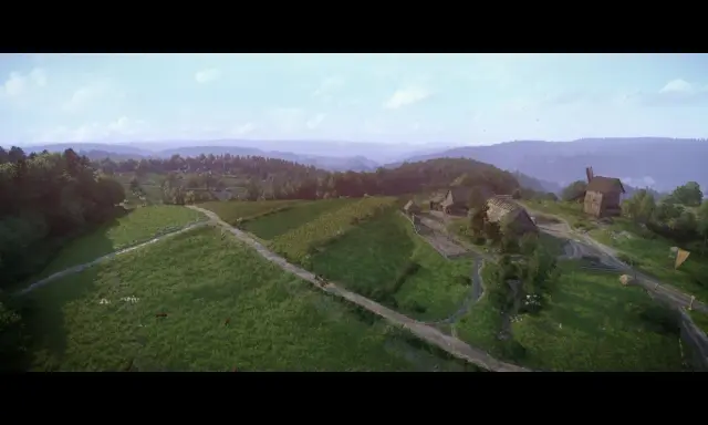 Krajobraz z gry Kingdom Come: Deliverance. Wiatrak i zabudowania na wzgórzu, pola uprawne i lasy w tle.
