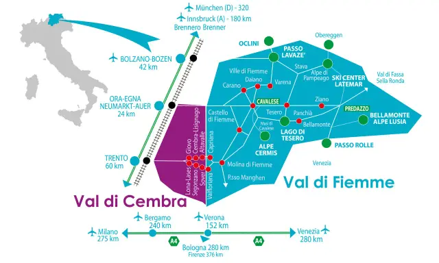 Cartina della Val di Fiemme e Val di Cembra, con i paesi principali, collegamenti stradali e ferroviari, e distanze da città come Trento e Bolzano.