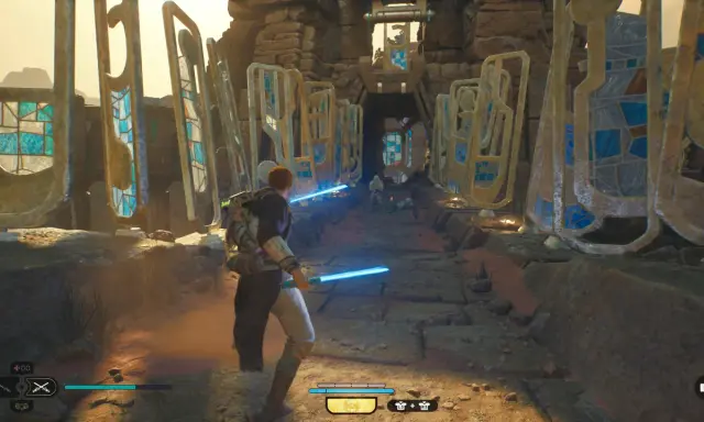 Jedi Survivor: Cal Kestis z niebieskim mieczem świetlnym w starożytnych ruinach, walczy z droidami.