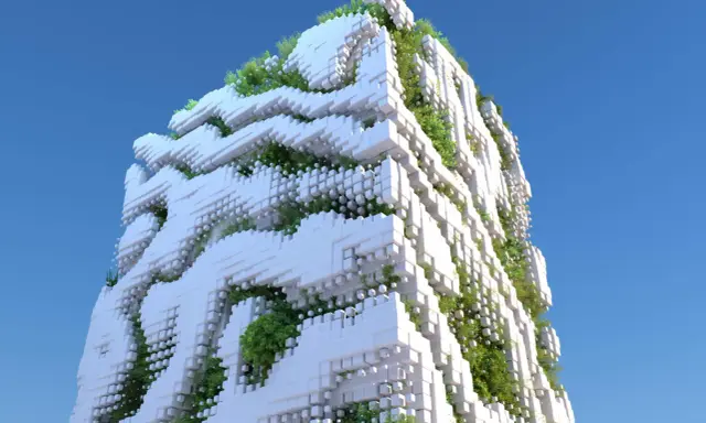 Edifici ecosostenibili con facciate a blocchi bianchi e vegetazione rigogliosa che si intreccia, sotto un cielo azzurro.