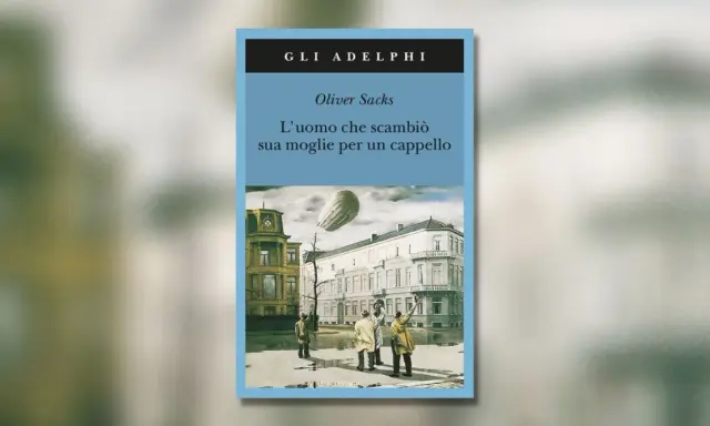 Copertina del libro "L'uomo che scambiò sua moglie per un cappello" di Oliver Sacks. Un'illustrazione surreale con un dirigibile e figure che alzano le mani verso il cielo.