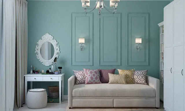 Elegancka toaletka z lustrem i kosmetykami, obok wygodna sofa. Idealne miejsce, by połączyć biurko z toaletką w stylowy sposób.