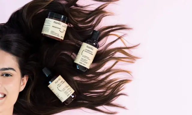 Capelli scuri e luminosi con prodotti Naste: maschera, shampoo e balsamo. Scopri la differenza tra balsamo e maschera per una chioma perfetta.
