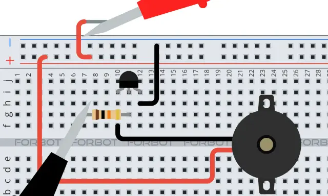 Układ na płytce stykowej z tranzystorem mosfet asg, rezystorem i brzęczykiem.