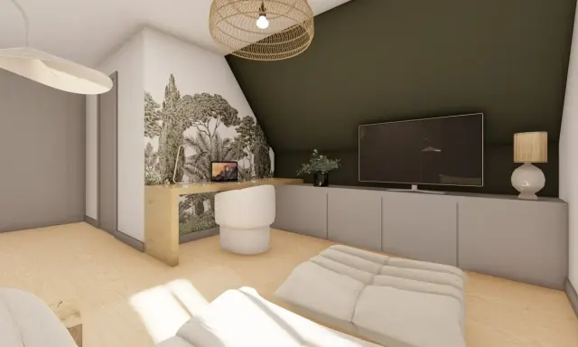 Bureau dans une chambre mansardée d'un coté, avec un mur végétal, une TV et un fauteuil confortable.