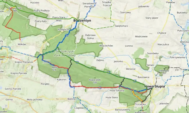 Mapa turystyczna z zaznaczonymi szlakami w Świętokrzyskim Parku Narodowym, prowadzącymi przez Bodzentyn i Nową Słupię.
