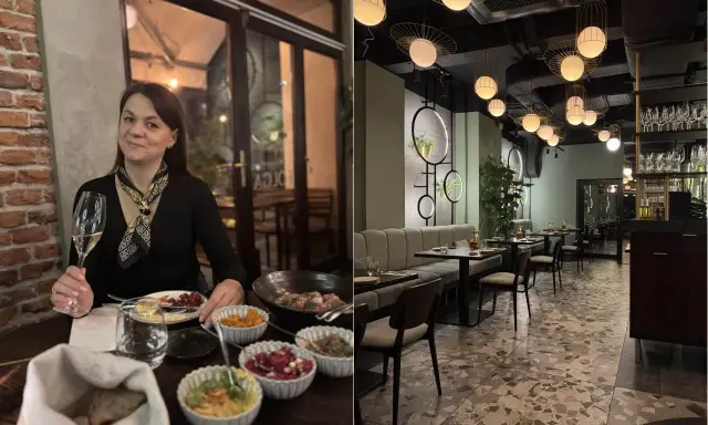 Kobieta z kieliszkiem wina w jednej z klimatycznych restauracji na krakowskim Starym Mieście. Wnętrze lokalu z nowoczesnym designem.