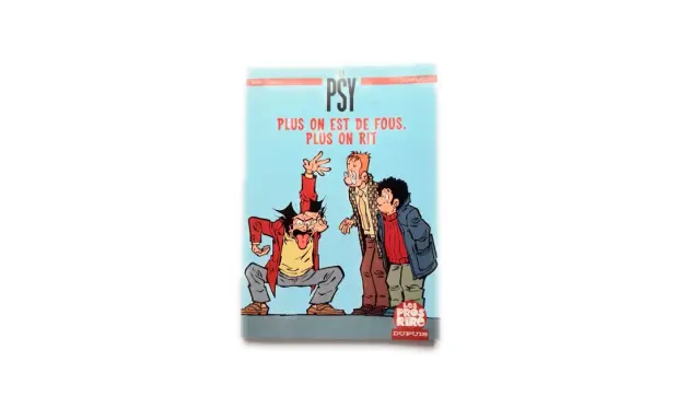 Bande dessinée "Les Psy" avec trois personnages excentriques. L'un d'eux, en avant, tire la langue. Le titre proclame : "Plus on est de fous, plus on rit".