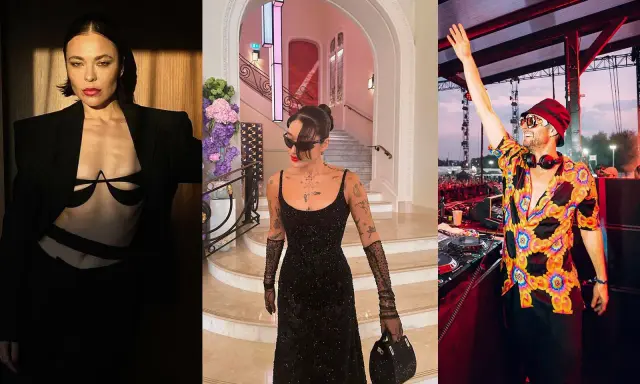 Un french dj con cappello e camicia colorata saluta il pubblico. A sinistra, due donne in abiti eleganti.