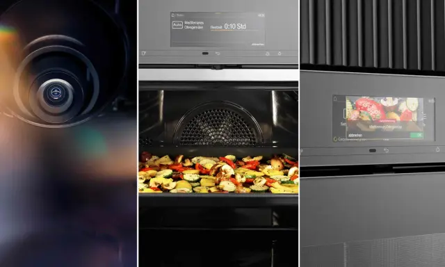 Nahaufnahme einer Miele Backofen Kamera, die durch das Glas auf mediterranes Ofengemüse blickt.