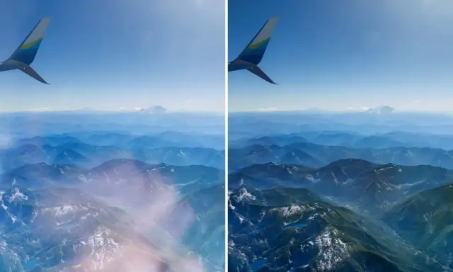Vista aerea di montagne innevate e azzurre, con l'ala di un aereo. Un esempio di come fotografare una foto stampata, mostrando la differenza tra l'originale e una versione migliorata.