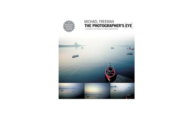 Book cover for "The Photographer's Eye" by Michael Freeman, featuring a serene seascape with boats and a lone figure in a red boat, showcasing the power of a photographer's eye.