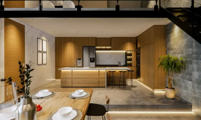 Cuisine moderne et salle à manger dans un **souplex def**. Bois, marbre et béton créent une ambiance chaleureuse. Éclairage LED subtil.