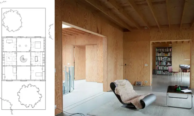 Plano de casa con paredes de madera y un sillón acogedor, ideal para un flex living.