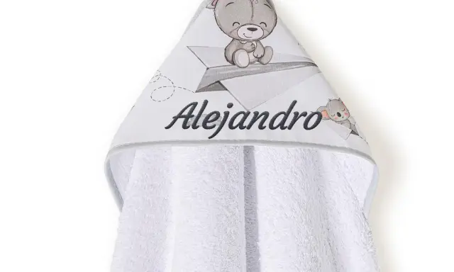 Capa de baño para bebé con osito y avión de papel. Las medidas de esta capa de baño para bebé son ideales para envolver a tu pequeño.