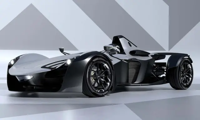 Ein futuristischer BAC Mono Supersportwagen in Schwarz und Silber, bereit für die Rennstrecke.