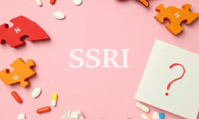 Pigułki, puzzle z literami i znak zapytania. Co to SSRI?