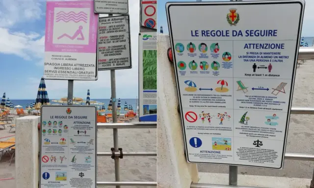 Cartelli informativi su una spiaggia libera attrezzata con regole di distanziamento e norme di comportamento.