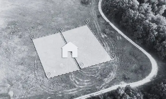 Wizualizacja wyznaczonego terenu pod budowę domu z zaznaczonymi punktami granicznymi. Pokazuje, ile od granicy działki można postawić dom.