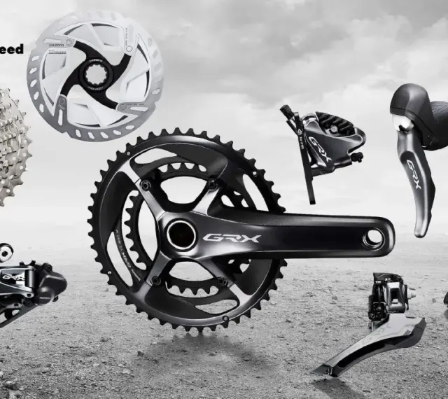 Komponenty rowerowe Shimano GRX: kaseta, korba, przerzutki, hamulce i manetki. Idealne do gravelowych wypraw.