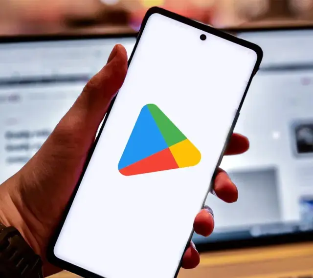 Smartfon z logo Sklepu Play. Dowiedz się, jak zainstalować Sklep Play na swoim urządzeniu.
