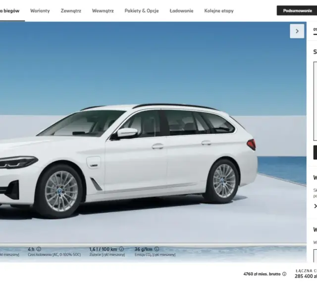 Białe BMW 530e Touring hybrydowe, gotowe do jazdy, z automatyczną skrzynią biegów.
