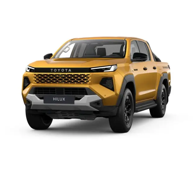 Złoty Toyota Hilux, nowy model pickup, z charakterystycznym grillem i nowoczesnymi światłami. Gotowy na każdą przygodę.