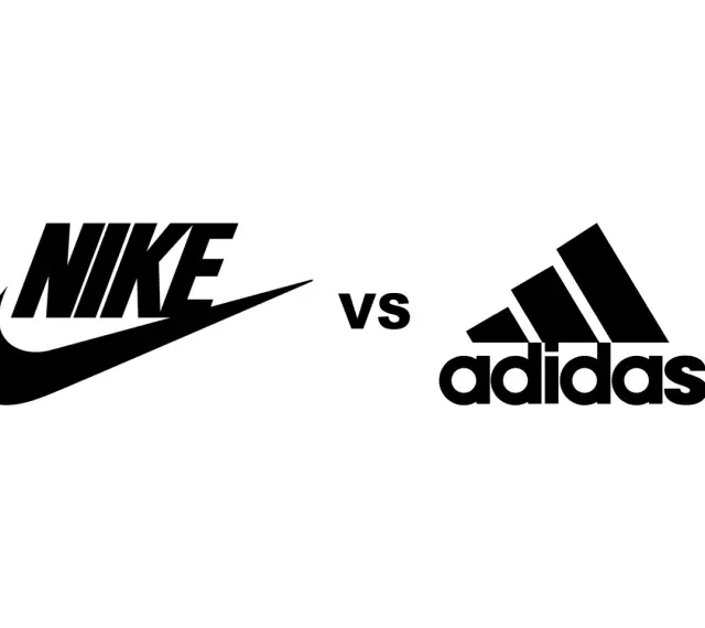 Logo Nike kontra logo Adidas. Dwa giganty sportowe w starciu.