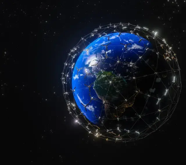Ziemia otoczona siecią satelitów Starlink, symbolizującą globalny zasięg i prędkość internetu.