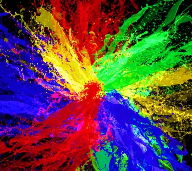 Eksplozja kolorów: czerwony, zielony i niebieski tworzą dynamiczną paletę kolorów RGB na czarnym tle.