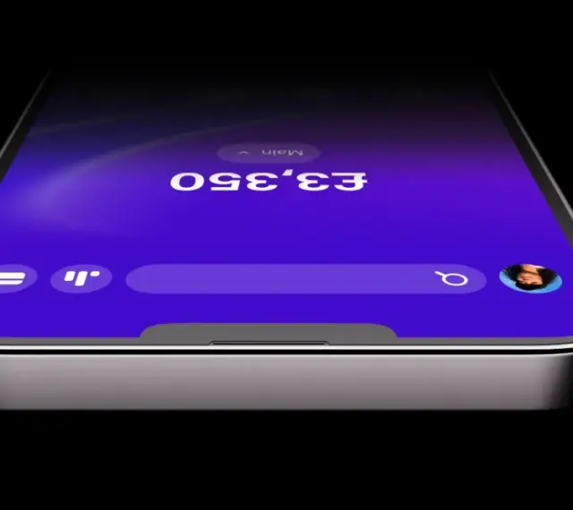 Telefon z aplikacją Revolut, pokazujący saldo £3,350. Dowiedz się, jak założyć konto Revolut i zacząć zarządzać finansami.