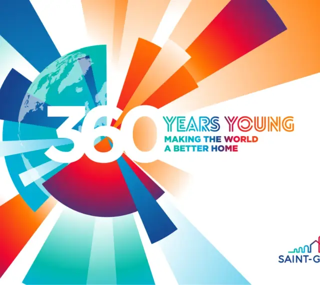 360 lat Saint-Gobain: "Making the World a Better Home". Kolorowa grafika z globusem i promieniami.