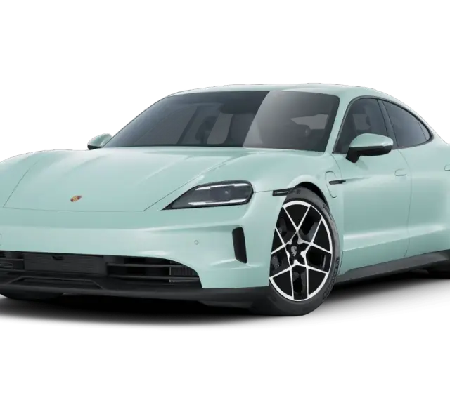 Miętowe porsche elektryczne z czarnymi felgami, gotowe do ekologicznej jazdy.
