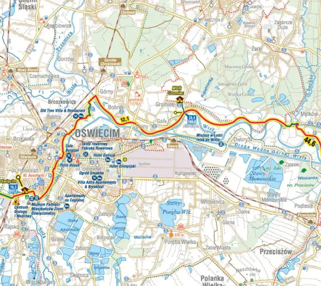 Trasy rowerowe Małopolska: mapa okolic Oświęcimia z zaznaczonymi szlakami, atrakcjami i drogami wodnymi Wisły.