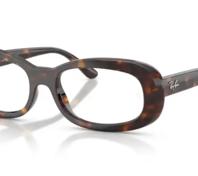 Okulary Ray-Ban w panterkę z uszkodzonym antyrefleksem na soczewce.