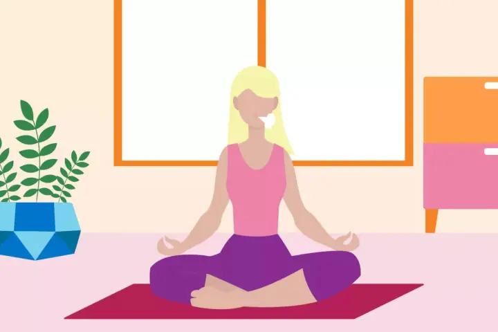 A woman meditates, breathing deeply to relax mind and body.