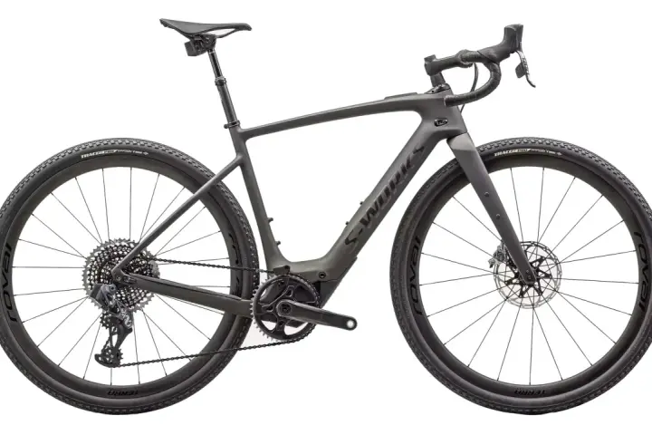 A sleek, dark grey gravel bike, showcasing one of the versatile types of bikes built for adventure.
