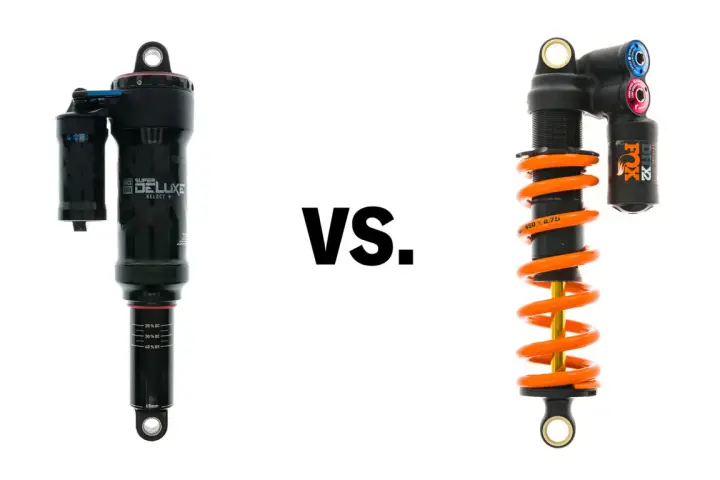 A black air shock and an orange coil shock are shown side-by-side, illustrating the coil vs air shock debate for mountain bikes.