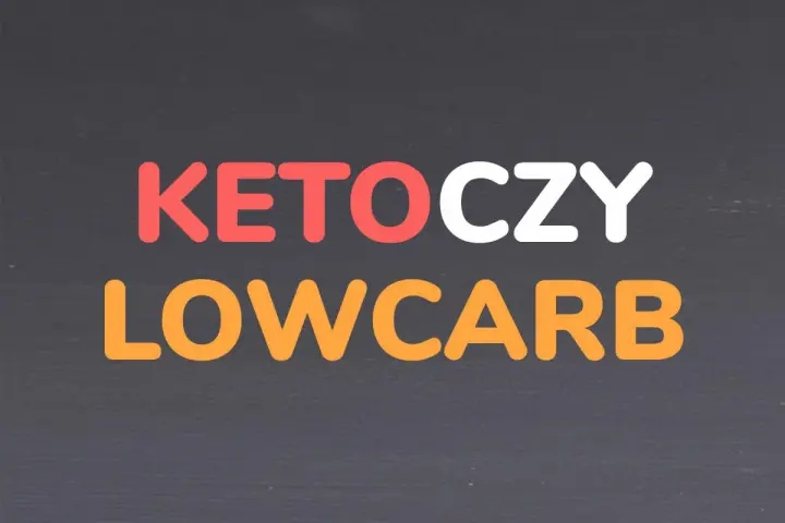 Napis KETO CZY LOW CARB w kolorach czerwonym, białym i pomarańczowym na ciemnym tle.
