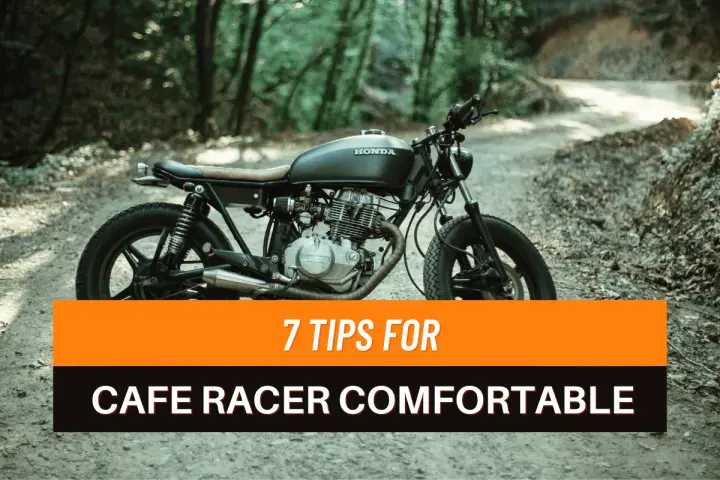 Una moto cafe racer nera su una strada sterrata nel bosco. 7 consigli per rendere confortevoli i modelli cafe racer.