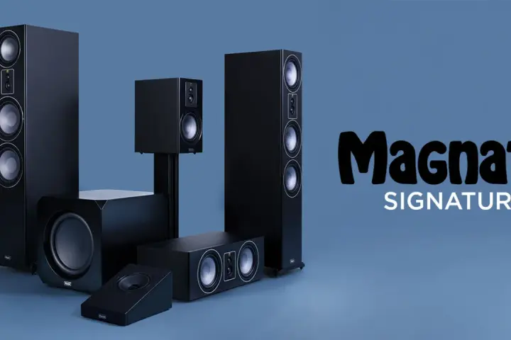 Zestaw czarnych głośników Magnat Quantum 605, w tym kolumny podłogowe, subwoofer i głośniki centralne, prezentuje się elegancko na niebieskim tle.